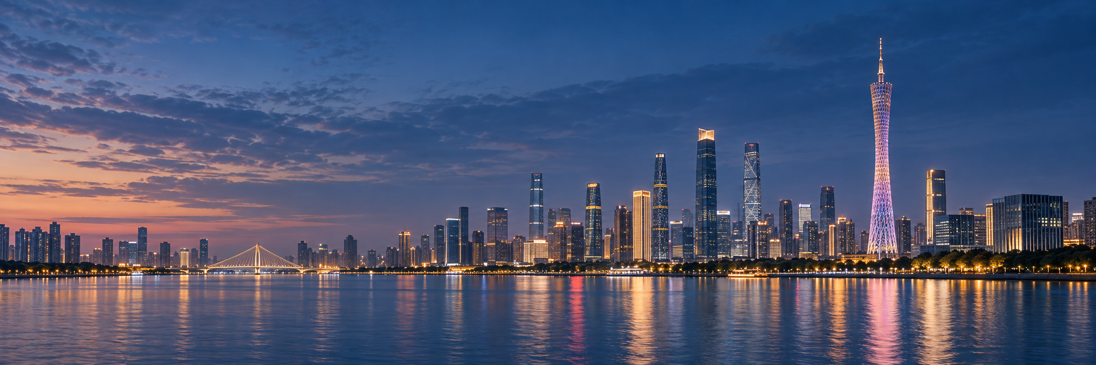 Guangzhou skyline and Canton Tower reflected in the Pearl River at blue hour