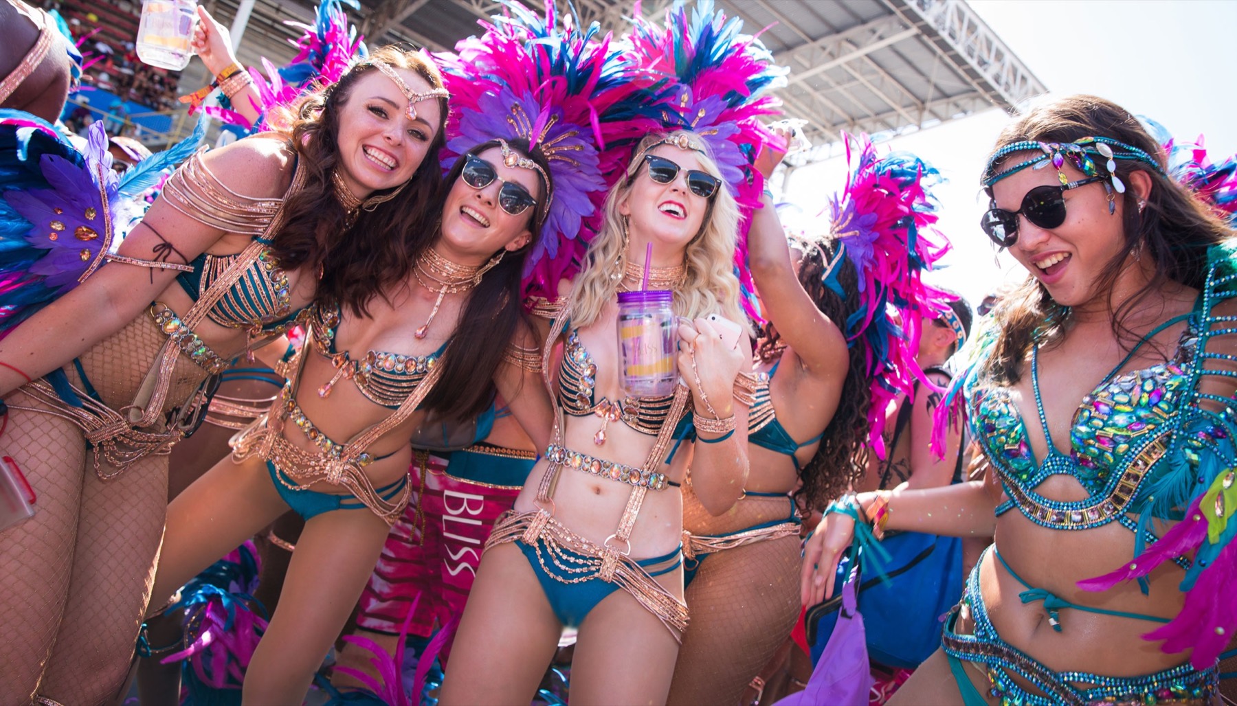 BLISS Carnival participants holding custom tumblers